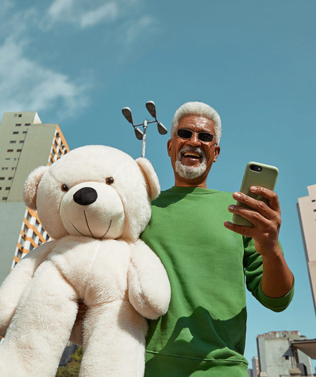 Happy dude with a teddy bear